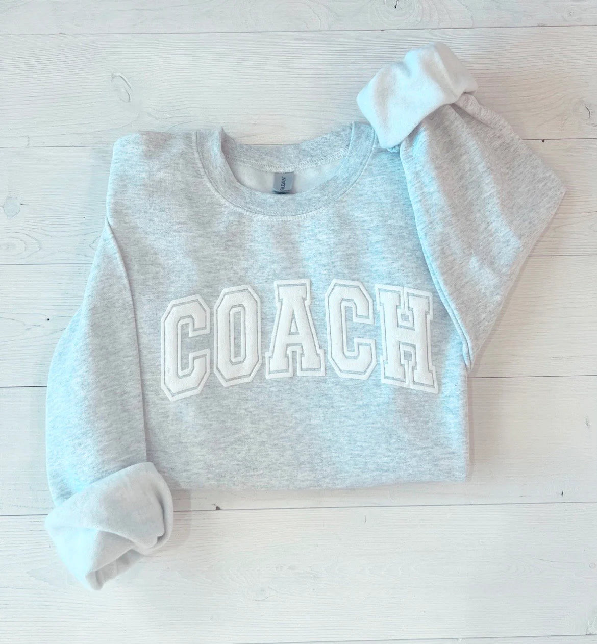 Custom Embossed Sweat Suit for Cheer Coach