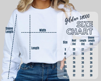A Gildan 18000 size chart with measurements for bust, length, and sleeve length, overlaid on a person wearing a white sweatshirt.