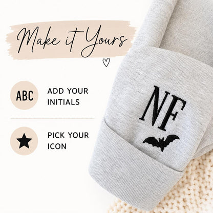 A graphic titled "Make it Yours" showing options to "Add Your Initials" and "Pick Your Icon" with an example of "NF" and a bat embroidered on a cuff.