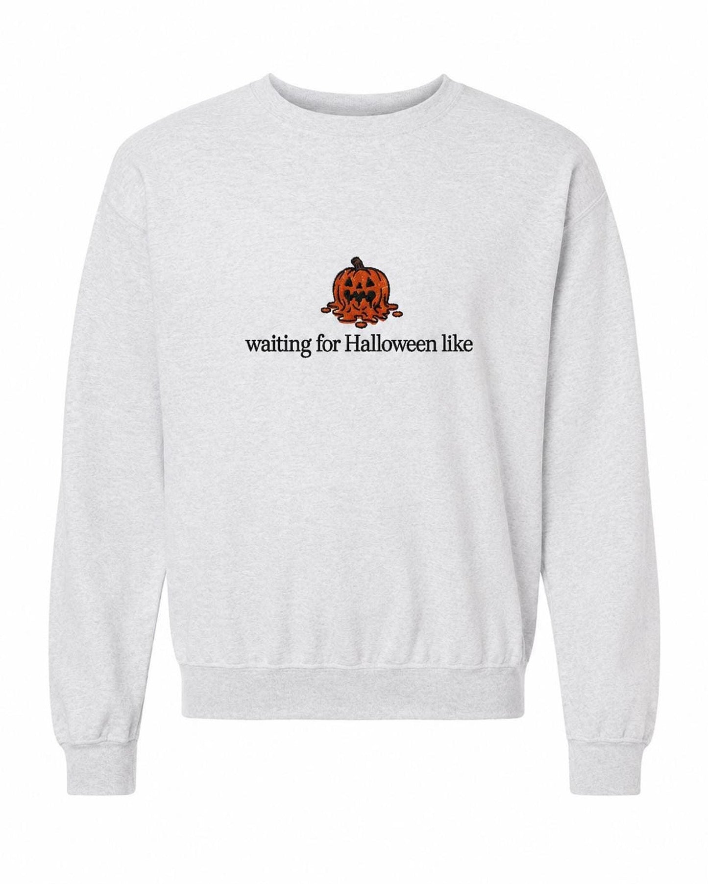 A light gray crewneck sweatshirt with a melted orange jack-o'-lantern and the text "waiting for Halloween like" printed on the front.