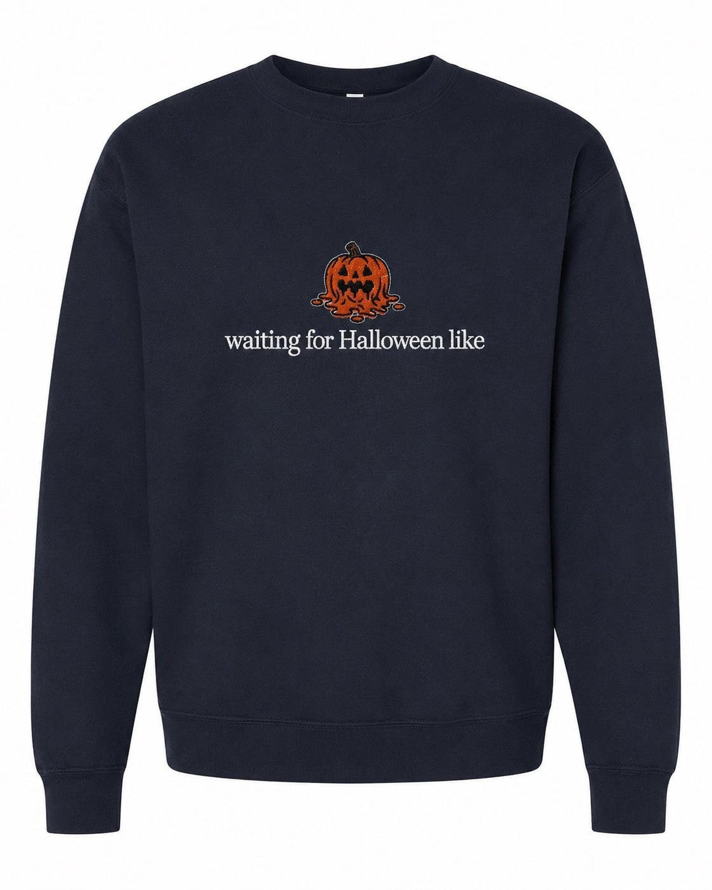 A navy blue crewneck sweatshirt with a melted orange jack-o'-lantern and the text "waiting for Halloween like" printed on the front.