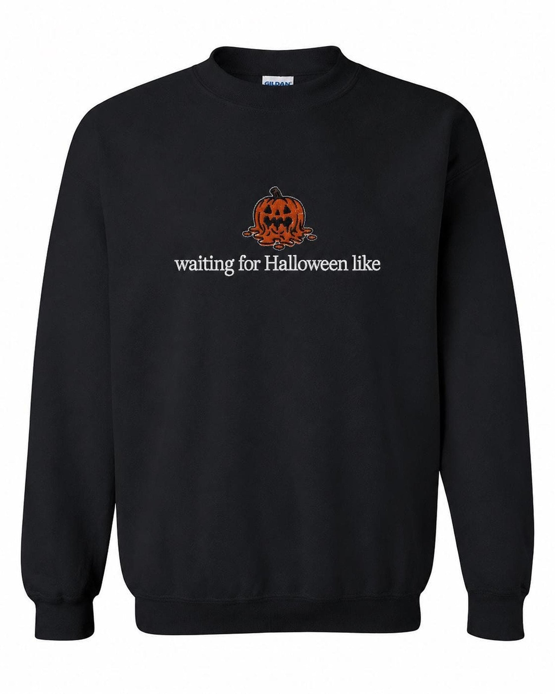 A black crewneck sweatshirt with a melted orange jack-o'-lantern and the text "waiting for Halloween like" printed on the front.
